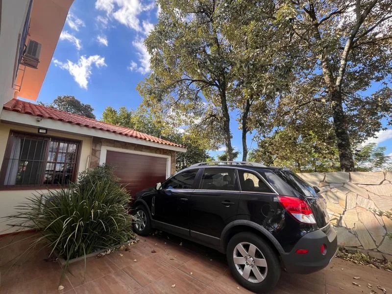 Casa com piscina e área de lazer no bairro Glória — foto 2