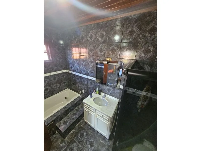 Casa em Sulina com 3 dormitórios, suíte master e vista panorâmica — foto 11