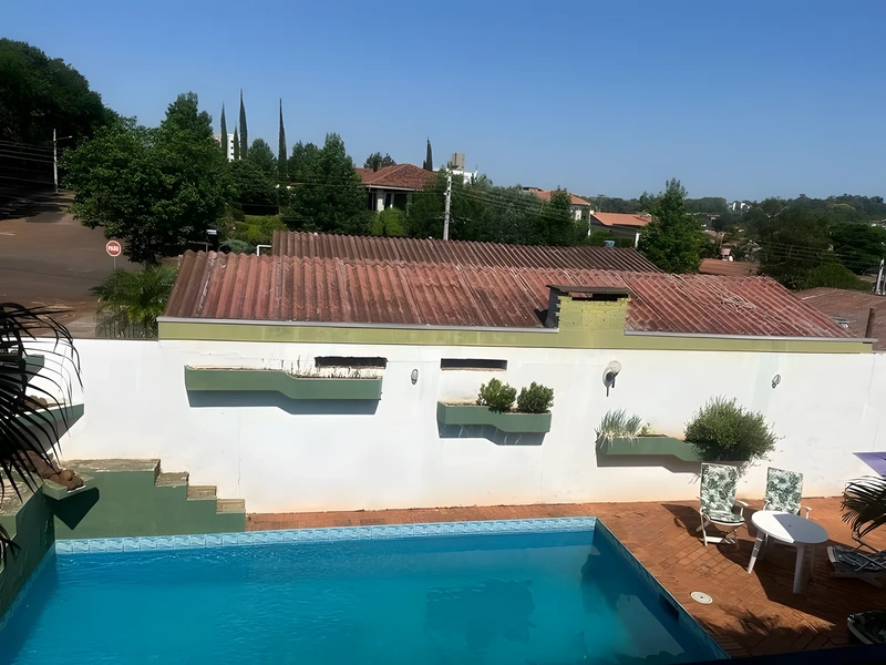 Casa com 4 dormitórios e piscina no bairro Centro – Santa Rosa/RS — foto 17 de 18