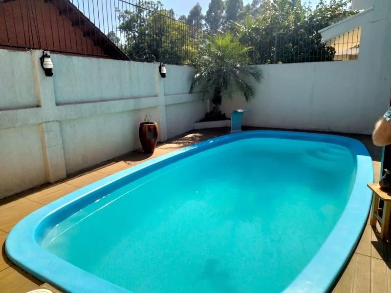 Casa com 3 dormitórios e piscina no Centro de Santa Rosa — foto 9