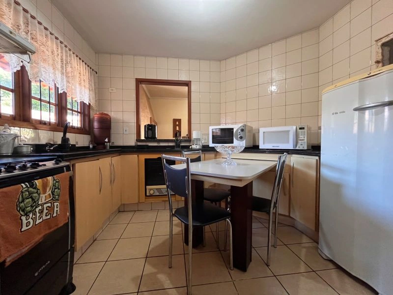 Casa com 4 dormitórios e 2 vagas no Centro — foto 8 de 51