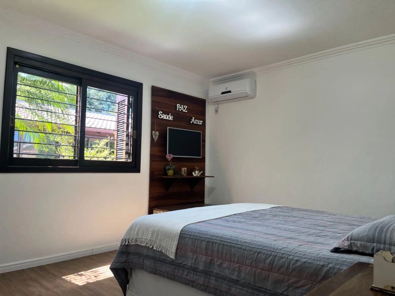 Casa com 2 dormitórios, 3 vagas e sistema fotovoltaico no bairro Cruzeiro — foto 30 de 38