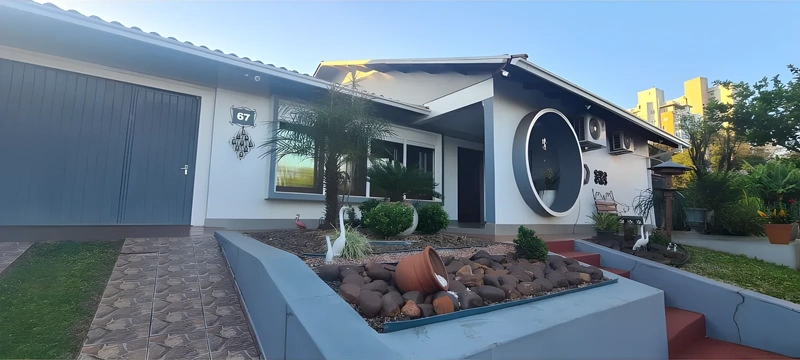 Casa com 3 dormitórios à venda, 254 m² por R$ 1.300.000,00 - Centro - Santa Rosa/RS — foto 2 de 32