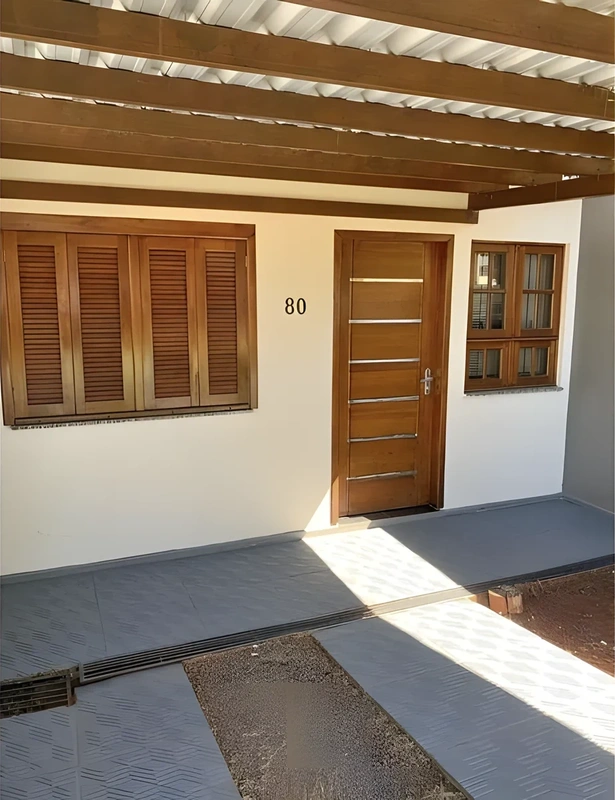 Casa geminada 2 quartos 1 banheiro Toda murada Quiosque com churrasqueira Garagem coberta 48m + quiosque - Próximo ao IFF - Financiável